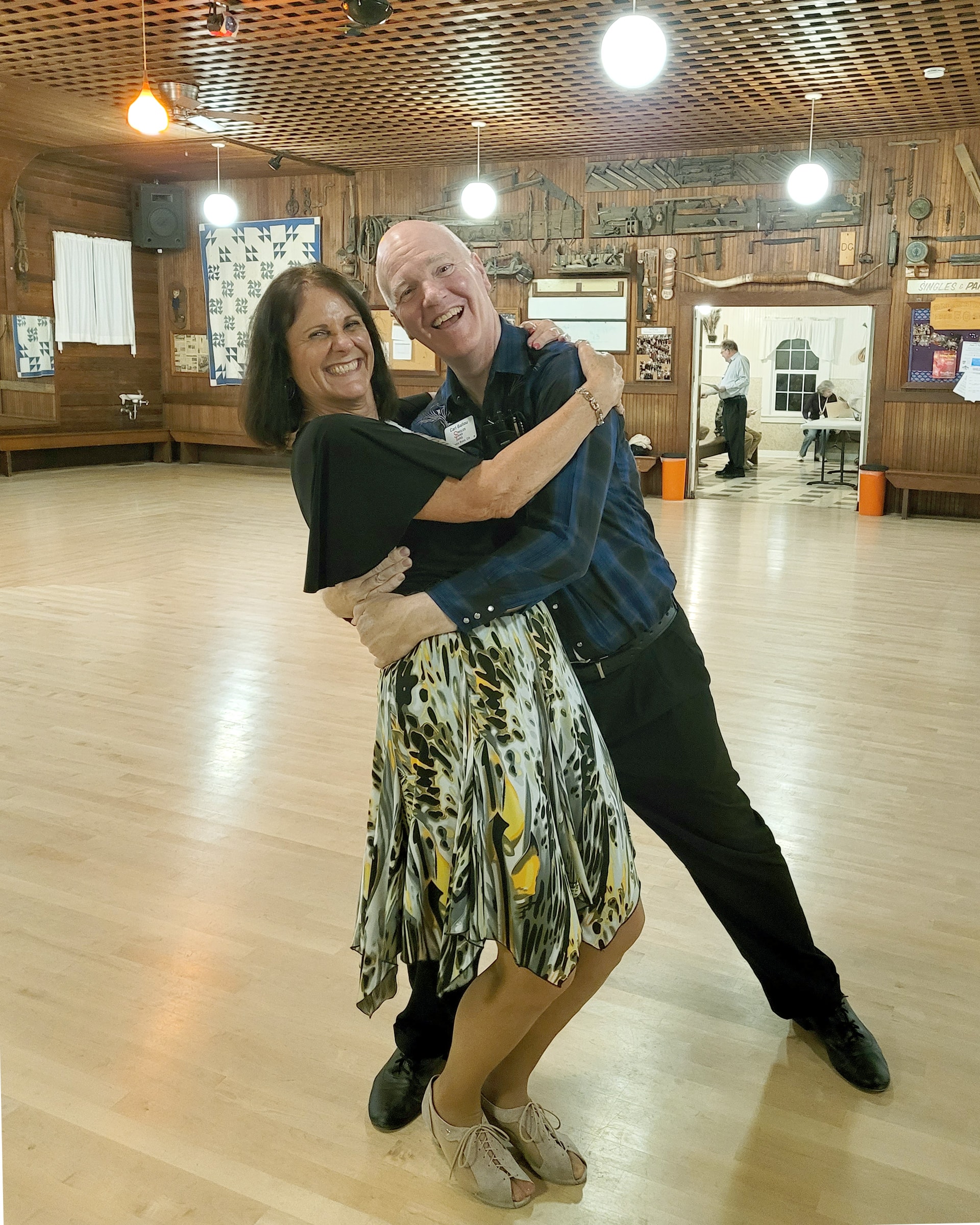 Group ballroom dance instruction class with couples in elegant formation in Grants Pass, Oregon